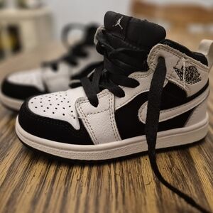 Jordan Kids Black and White High-Top Sneakers